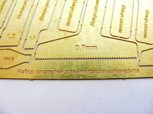 Spatulas set to simulate zimmerit